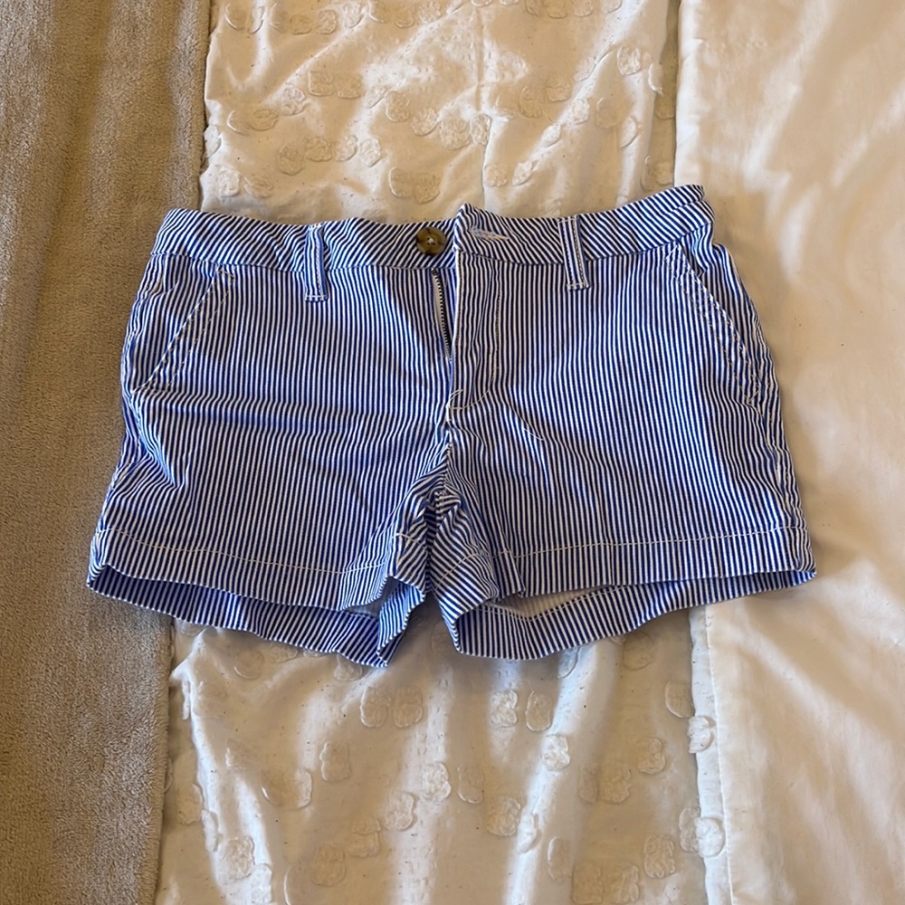 Copper key kids white and blue pinstripe shorts.